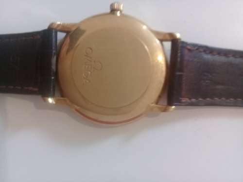 Omega Chronometer 18k Gold with original international warranty and box bought in Geneve 1997